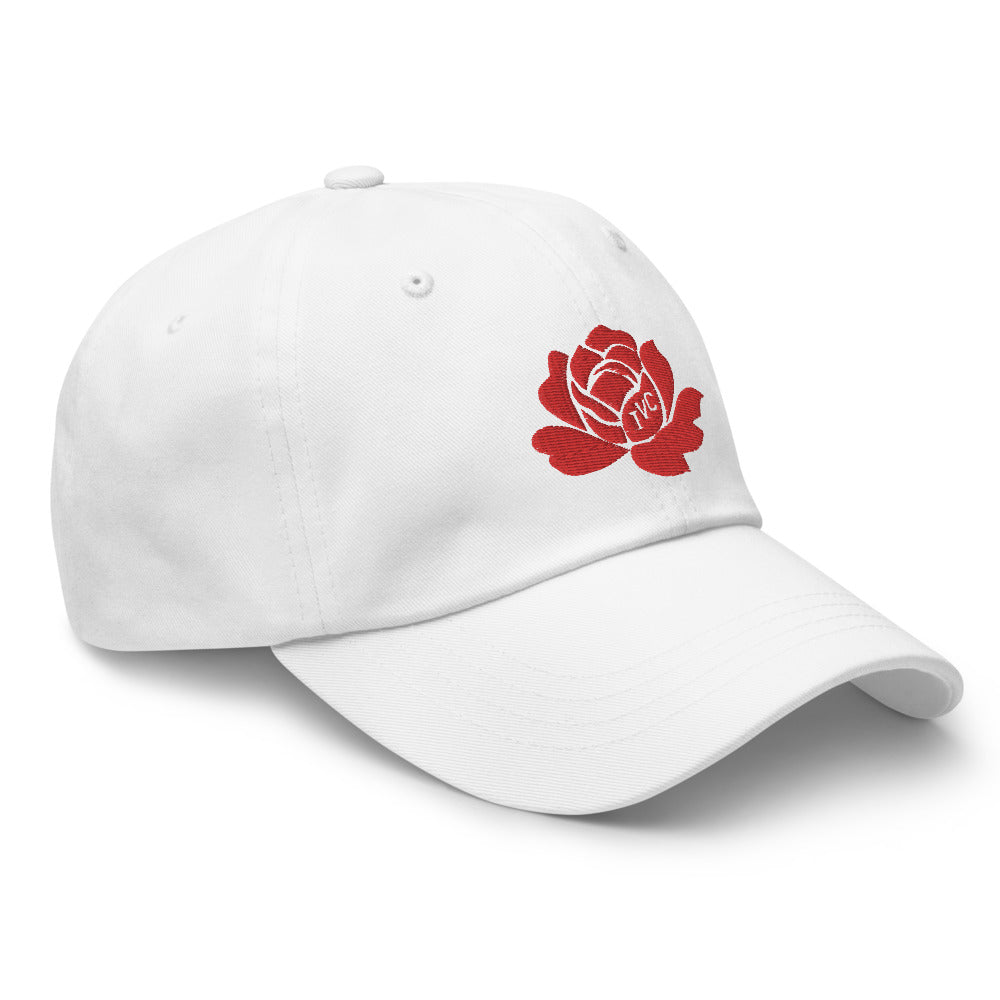 Make a statement year-round with our Roses Endure dad hat. Our beautiful, vibrant red embroidered rose stands out on our black and white cotton hats. Be strong, be resilient, and beautifully endure!